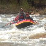 Rafting Charley River rapids.