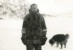 Roald Amundsen on the Yukon River in front of Eagle Bluff
