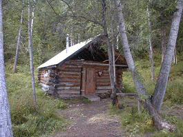 Built in the 1950's by a prominent Fairbanks optometrist as a hunting lodge, the Glenn Creek Cabin offers a lovely view of the Ogilvie Mountains. Built in the 1950's by a prominent Fairbanks optometrist as a hunting lodge, the Glenn Creek Cabin offers a lovely view of the Ogilvie Mountains.