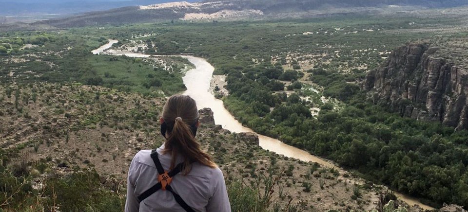 Hiker enjoys the views along Ernst Ridge Trail