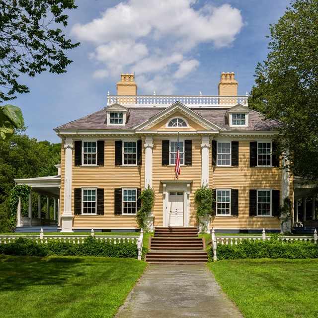 Two-story yellow house