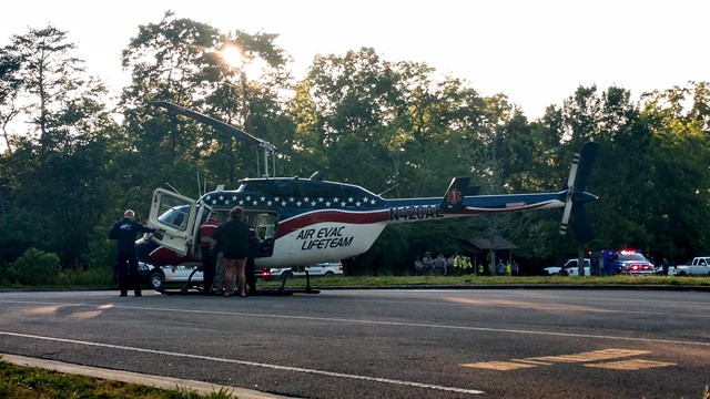 A medical helicopter takes off delivering an injured swimmer to a nearby hospital.