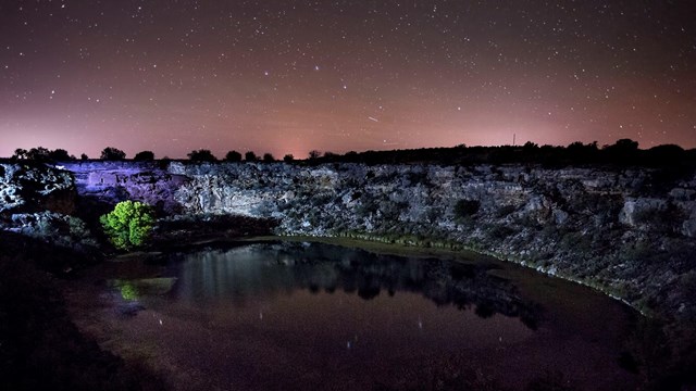 Montezuma Well under a starry sky