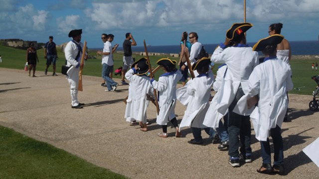 Young children dressed as Spanish soldiers