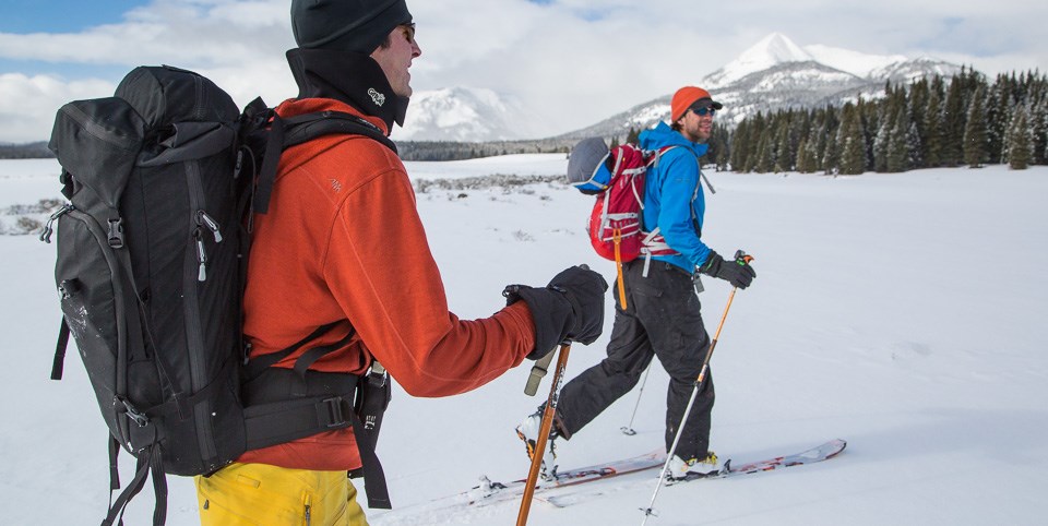 Two skiers heading into the Gallatin Mountains