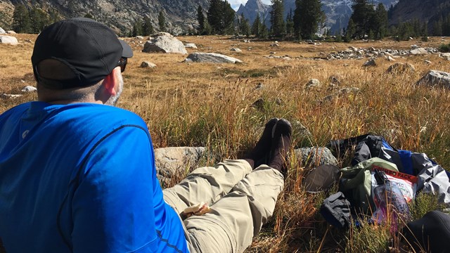 Hiker sitting and enjoying the view