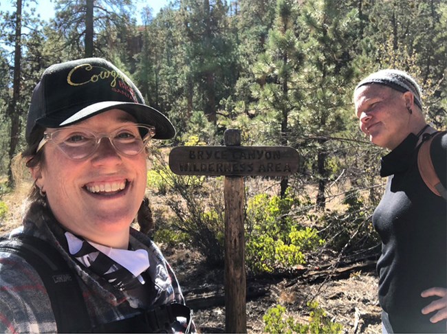 Two woman along a hiking trail