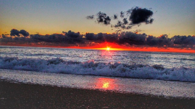 Sunrise on a snowy beach