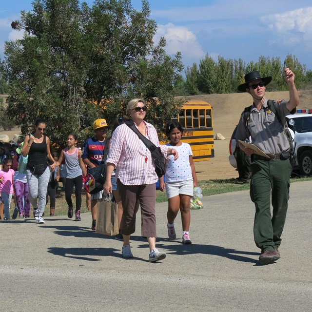 school group arriving at a park