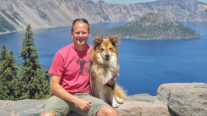 Visitor with his dog at Rim Village