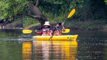 Two paddlers on the Mississippi River