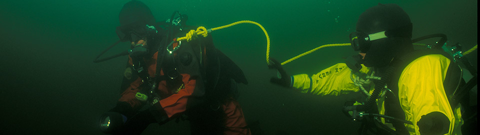 Two divers on tether