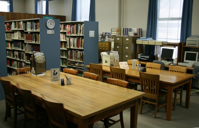 Library with tables and shelves of books