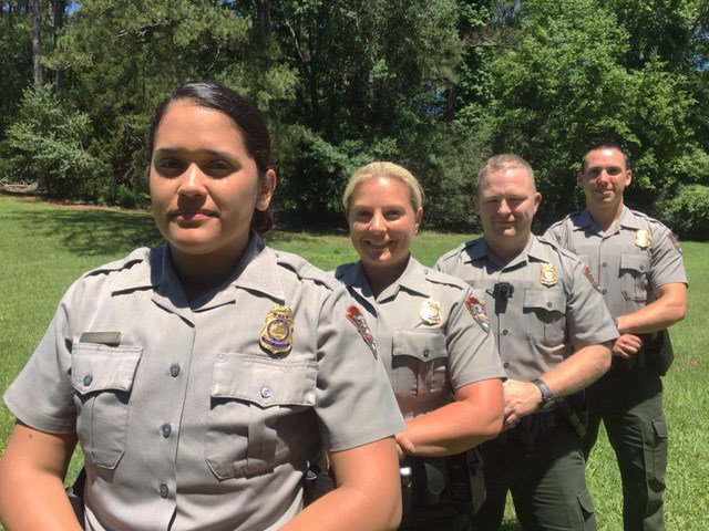 Rangers Rosileen Ferioli and Heather Hamilton, Trainee Nathan Edgerton, and Ranger Brandon Higgins