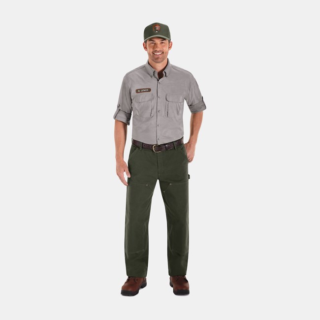 Summer Work Uniform An NPS employee wearing a green ball cap, a gray shirt with rolled up sleeves, green pants, and brown shoes