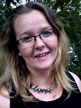Hannah Star Rogers woman with long blonde hair and glasses