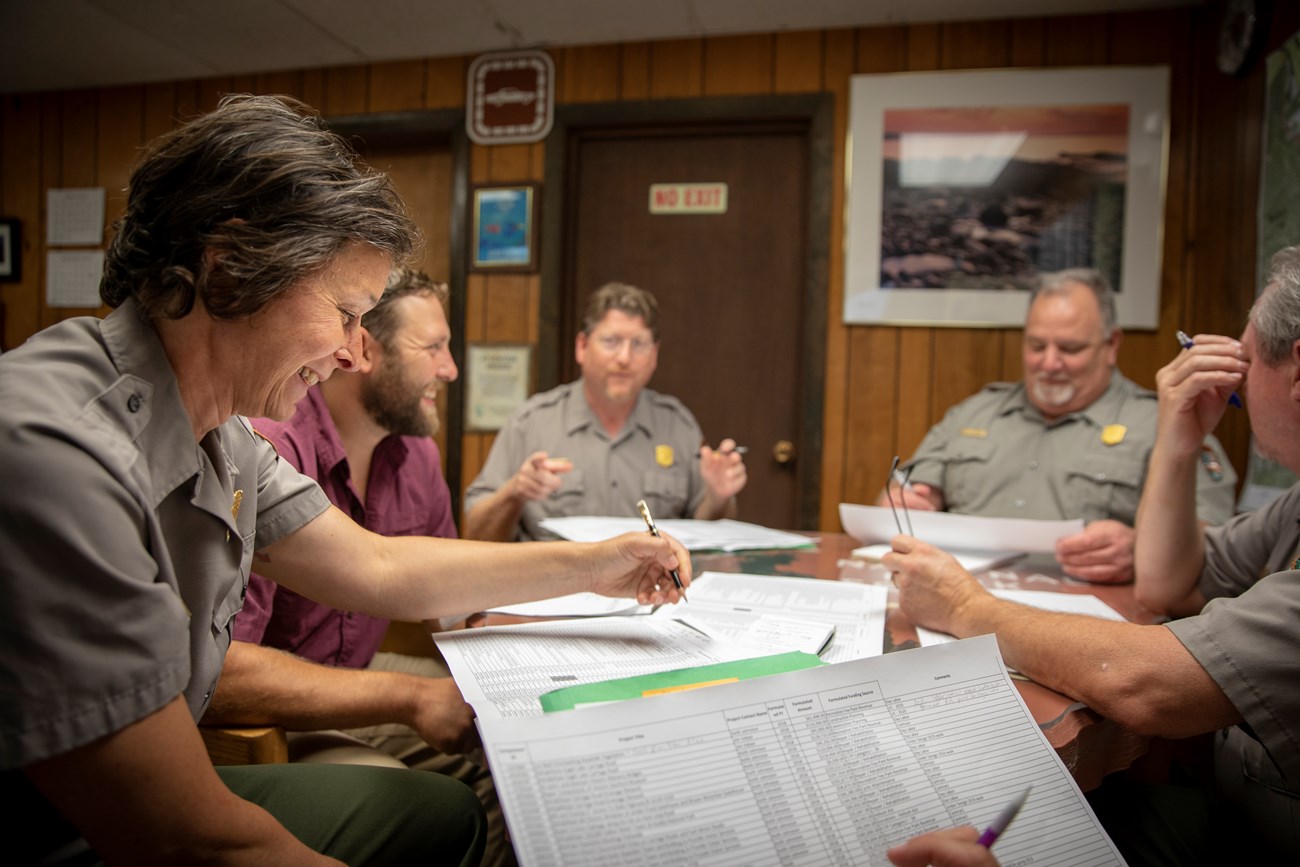 Group of people at a work table