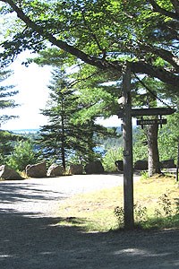 A signpost marks a carriage road intersection.