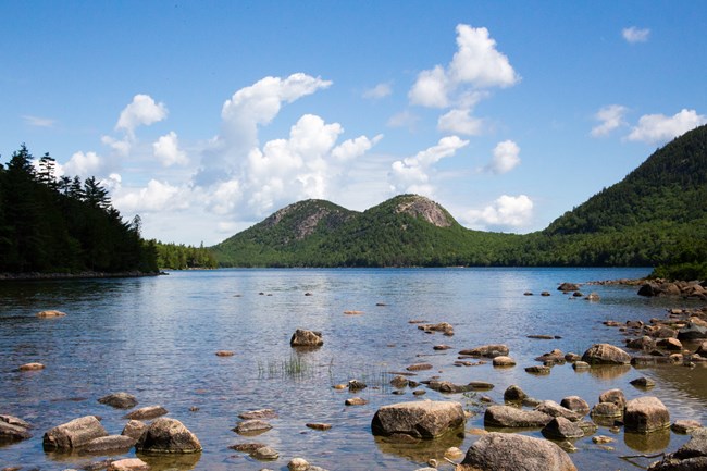 North and South Bubble are seen from across Jordan Pond