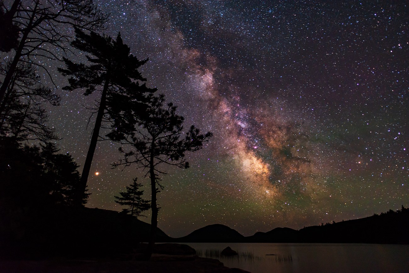 Night sky with the Milky Way over a lake