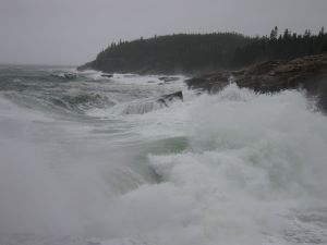 Large waves along rocky coastline in winter