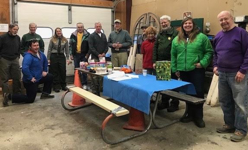 2017-Hartzog-Regional-Volunteer-Awarrd-to-ACAD-Sign-Shop_500 Group photo of sign shop volunteers in a workshop space