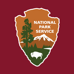 NPS arrowhead on a red background NPS arrowhead on a red background