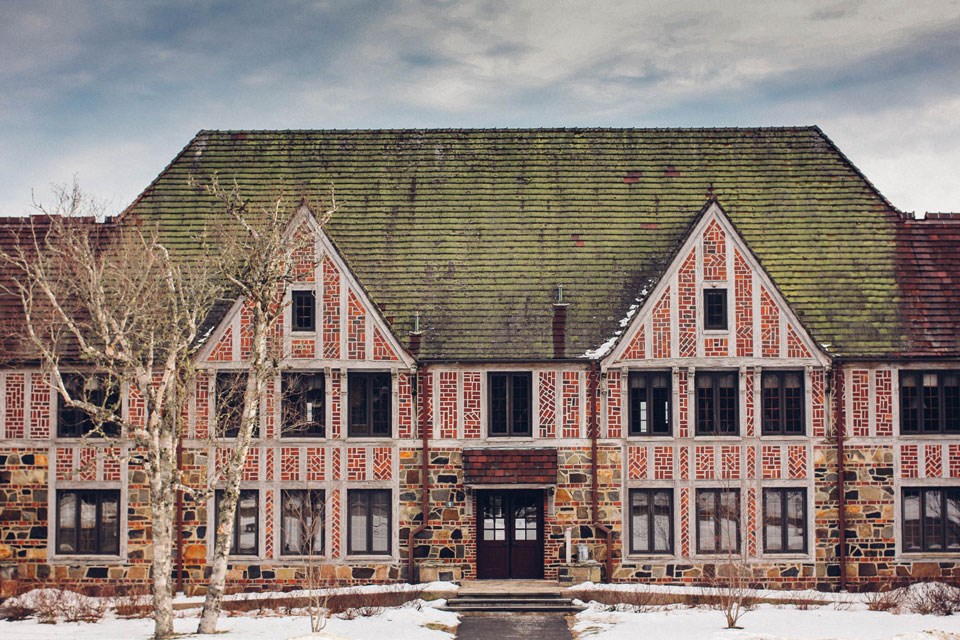 Elegant three-story stone and brick building Elegant three-story stone and brick building