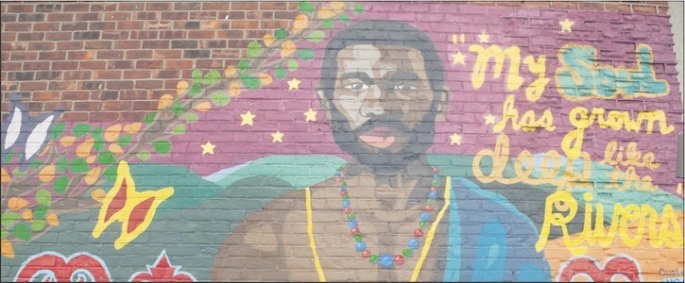 This image of Jan Rodrigues adorns a wall in Harlem