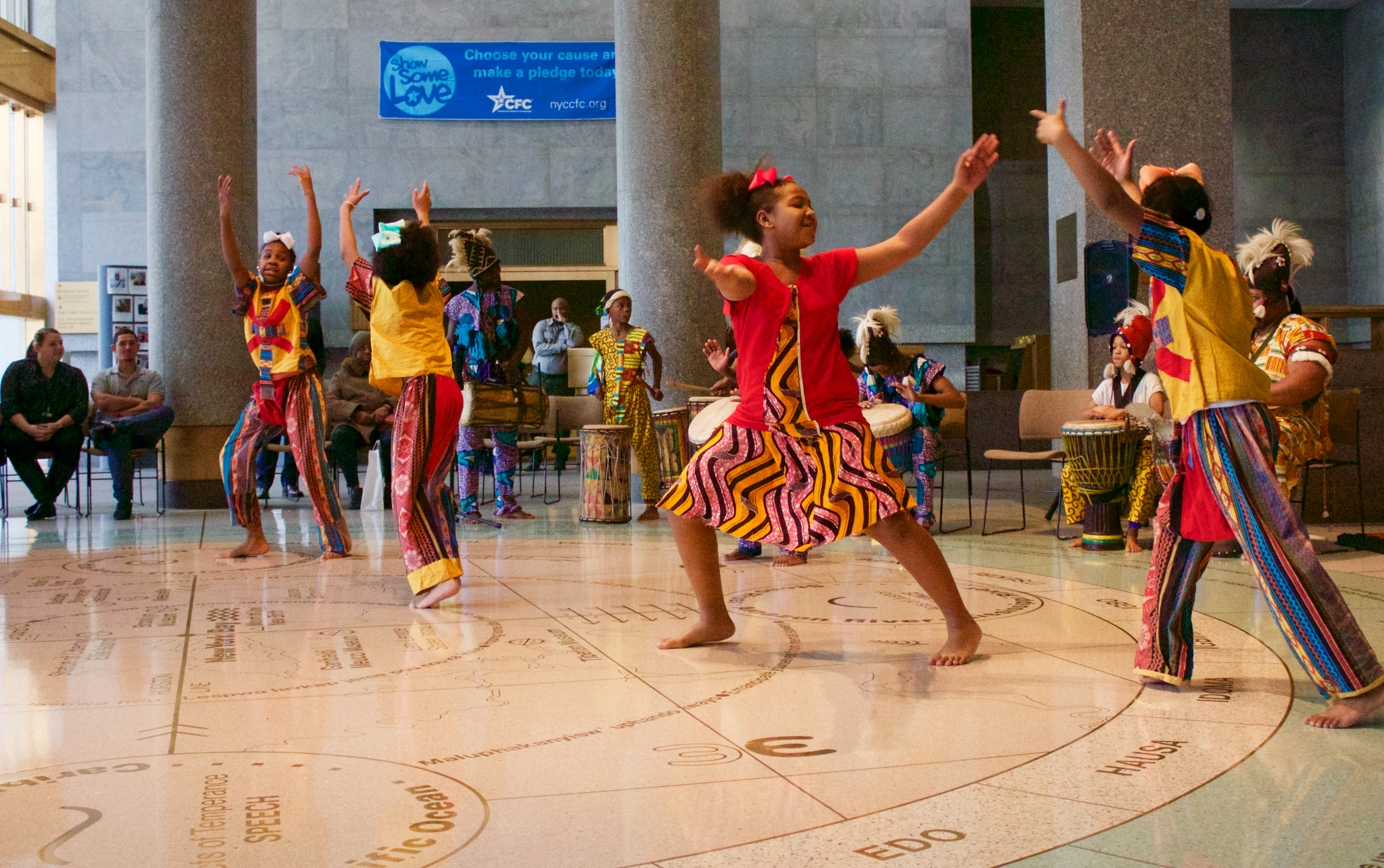 Performers dance in celebration