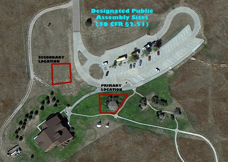 Overhead map of AGFO visitor center area showing public assembly sites. The primary location is on the southwest corner of the parking lot. The secondary location is square northeast of the visitor center and west of the parking lot.