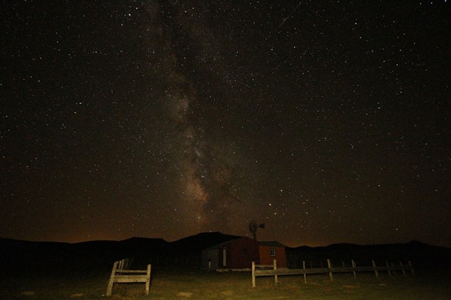 Milky Way over the Bone Cabin The night sky including the Milky Way with the Bone Cabin in the foreground.