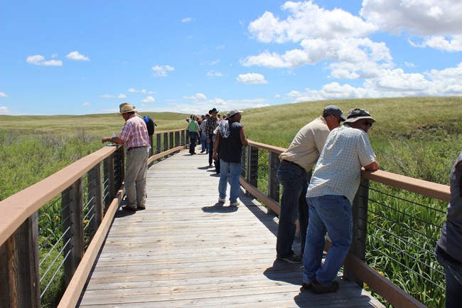 Group of visitors on Niobrara River Bridge.