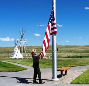 Ranger taking the flag down.