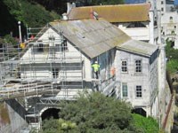 historic building wrapped in scaffolding