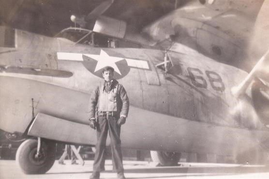 Crewman in front of his plane