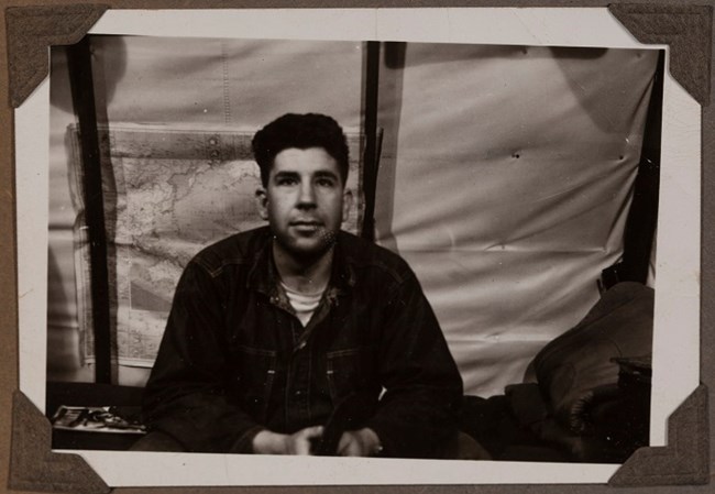 Man sitting on a bed