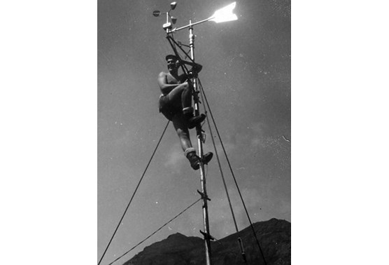 Walter Anderson atop a radio antenna