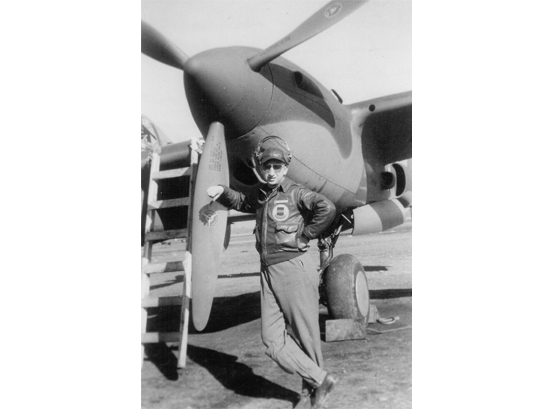 Kenneth Ambrose standing next to his plane Kenneth Ambrose standing next to his plane