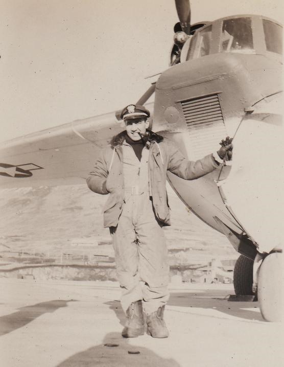 Lt. Juliana standing next to his plane, at Dutch Harbor