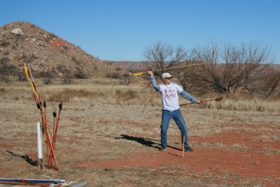 Throwing a spear using an atlatl.