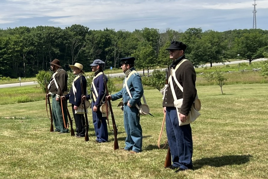 Costumed staff portray the American Highlanders.