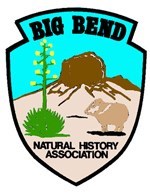 BBNHA logo is the shape of a shield with "Big Bend" in bold, capital letters along the top and "Natural History Association" in small capitals at the bottom. In it are simple line drawings of a yucca with a flowering stalk, a butte, and a javelina.
