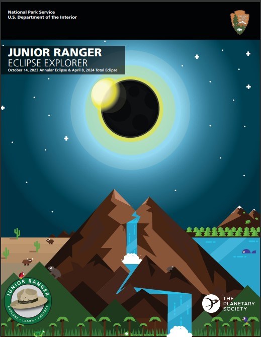 Front cover of booklet depicting an eclipse, stylized mountain, and river flowing over the mountain.
