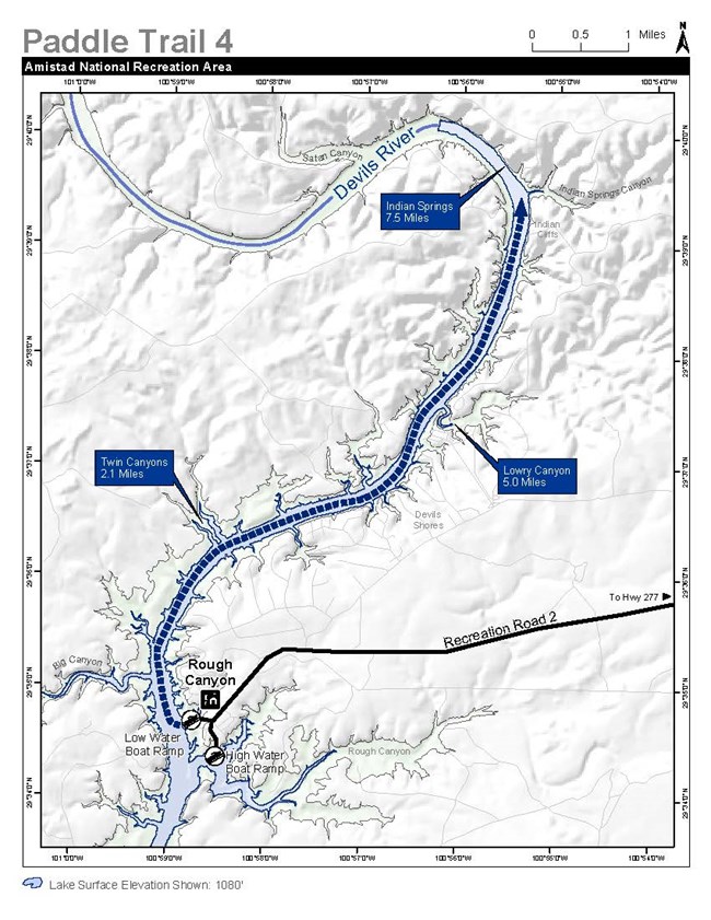 Map of the Devils River arm of the reservoir. Trail starts at Rough Canyon boat ramp and heads north up Devils River. Twin Canyons is noted at the 2.1-mile mark, Lowry Canyon at 5 miles, and Indian Springs at 7.5 miles.