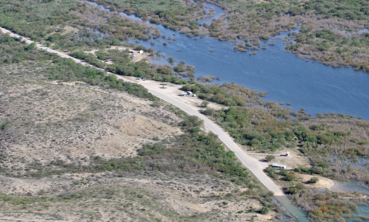 Aerial view of campground along roadside.
