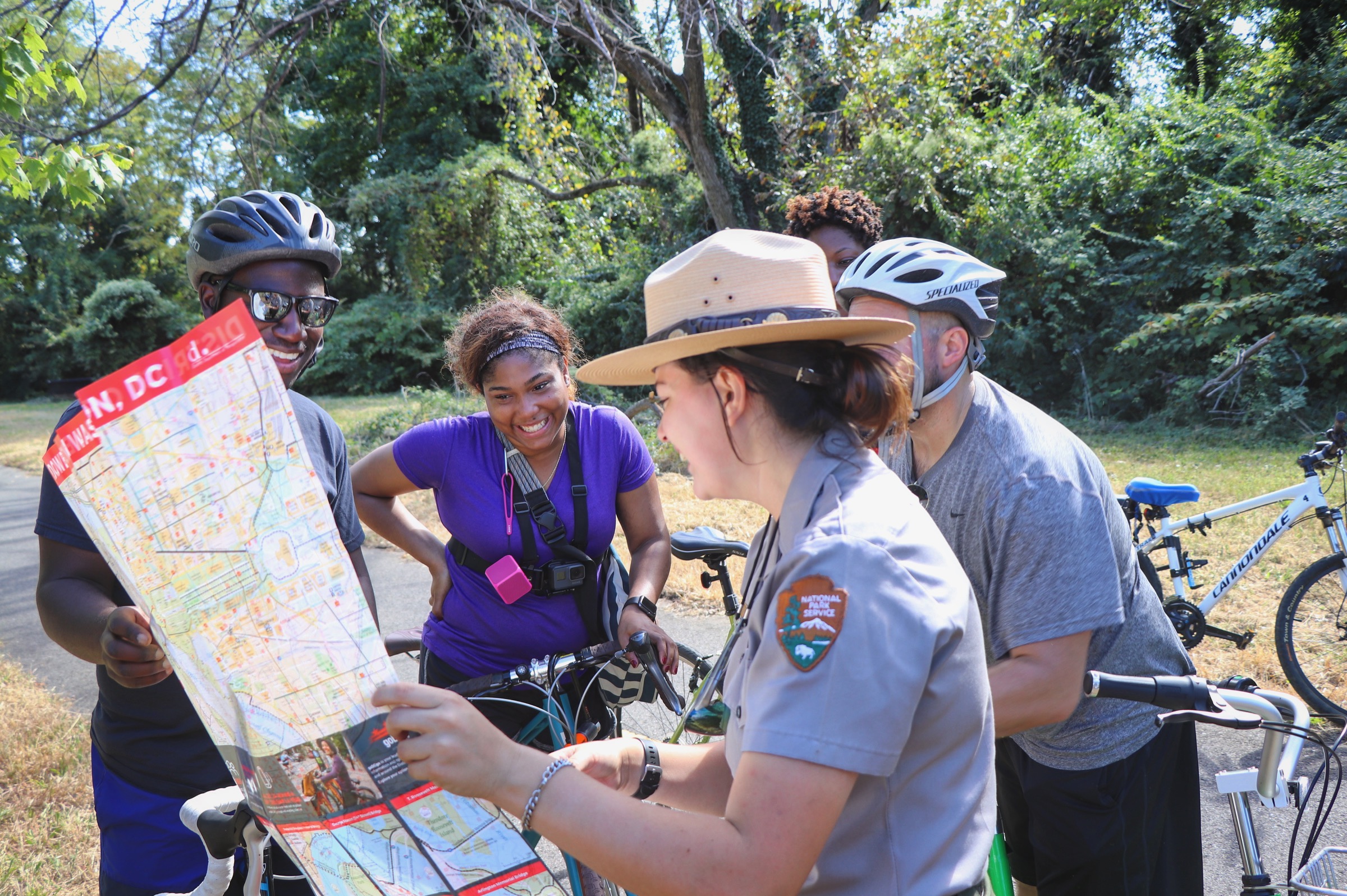 Bikers and park ranger on Anacostia Riverwalk Trail