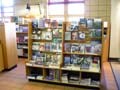 bookstore bookshelves with window in background. bookstore bookshelves with window in background.