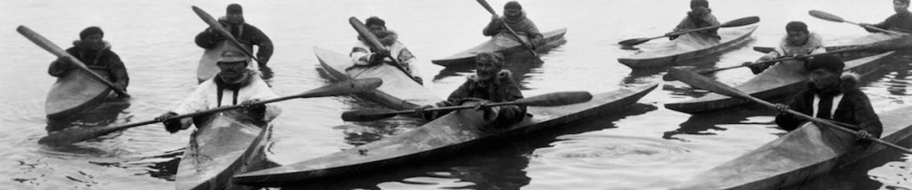 Historic Photo, group of Noatak kayakers in traditional kayaks