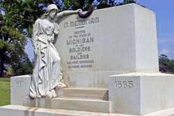 Stone monument with a female figure holding a wreath Stone monument with a female figure holding a wreath